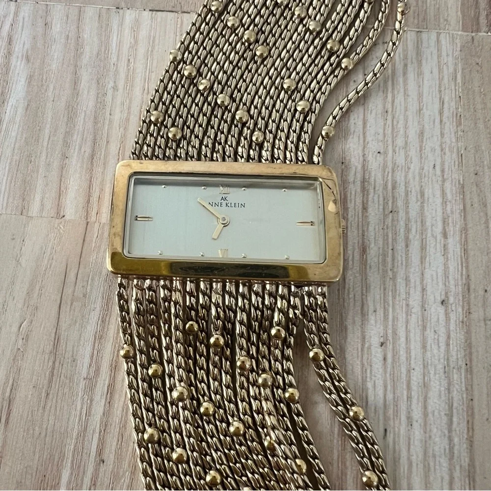 Anne Klein ladies gold tone multi strand bracelet watch NEW BATTERY